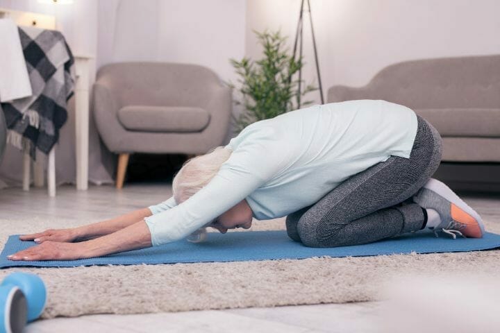 Senior Woman doing Balasana pose