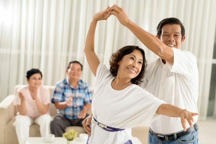 Mature asian couple dancing