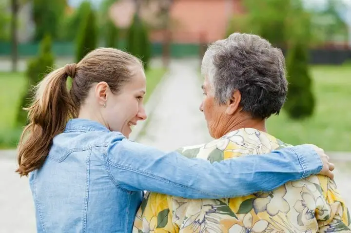 Elderly visited by her family