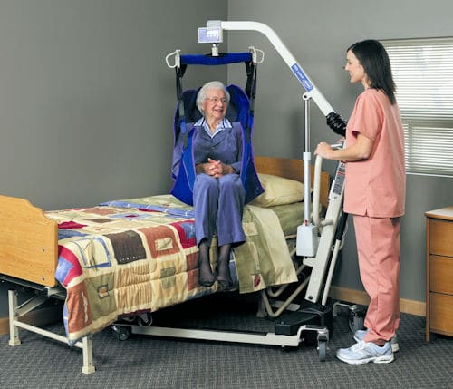 How do you use a Hoyer lift to move a patient from one position to another.