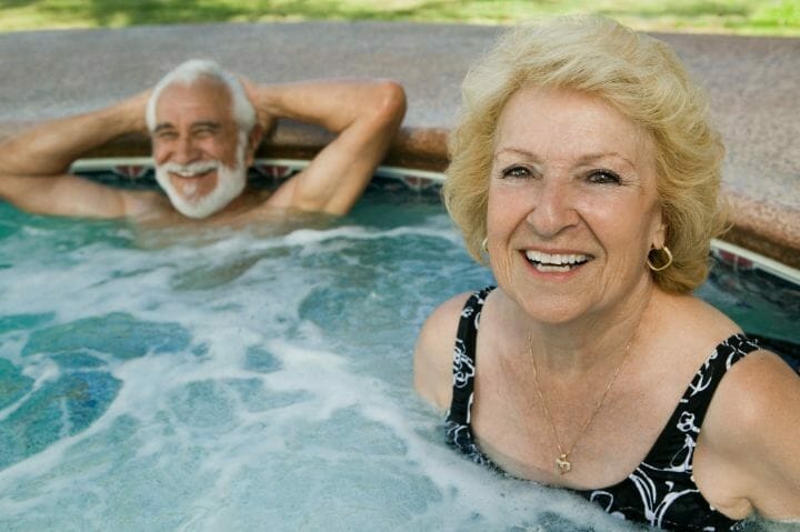 Senior couple enjoying their hot tub