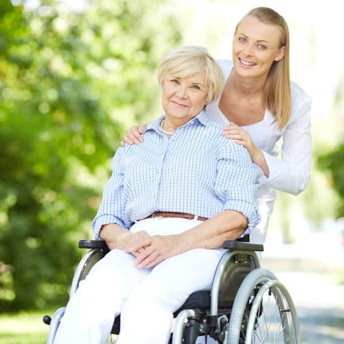 A wheelchair user and attendant