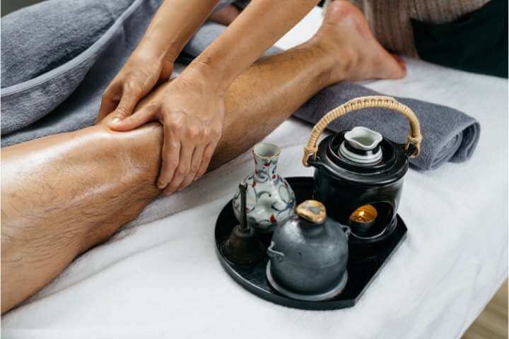 leg massage with therapy oil