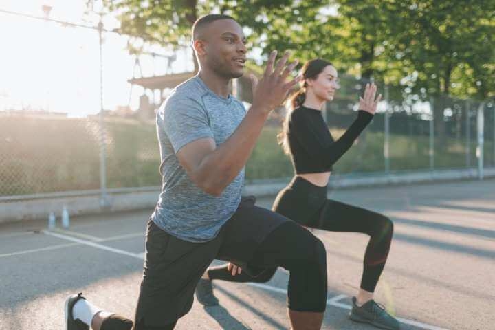 man and woman working out