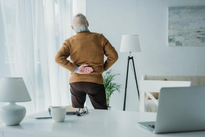 senior with lower back pain