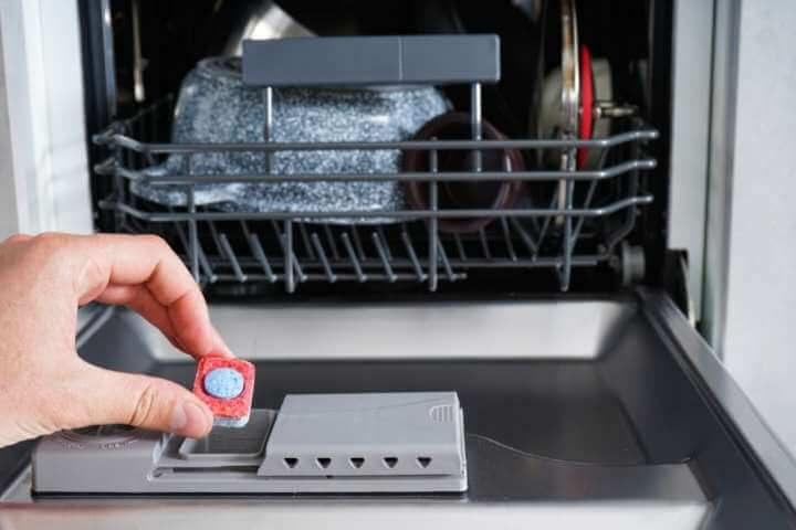 putting detergent bar on dishwasher