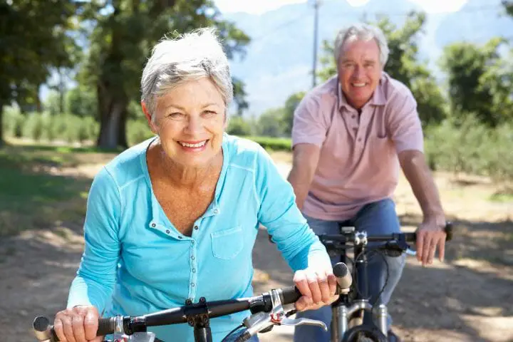 senior couple cycling outdoor