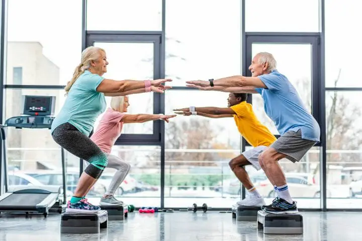 Group of senior doing squats