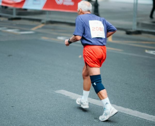 Elderly Person Running a Marathon