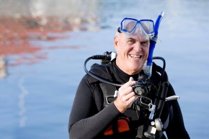 senior man on scuba diving gear