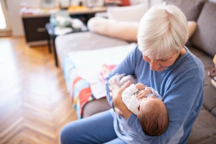 grandma taking care of grandkid