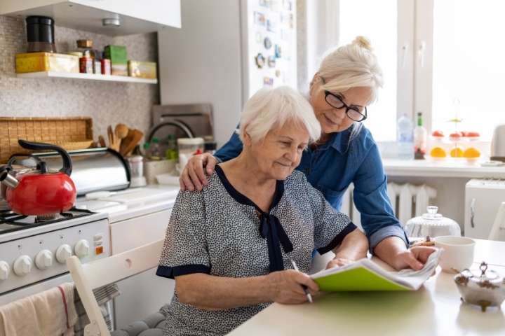 old woman writting