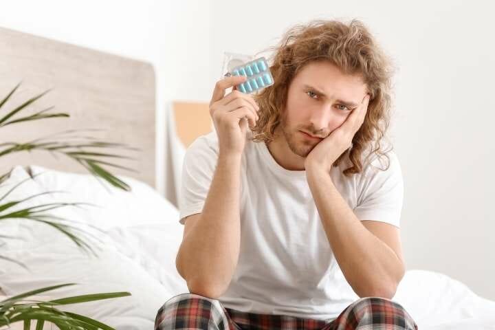 man with oral medication