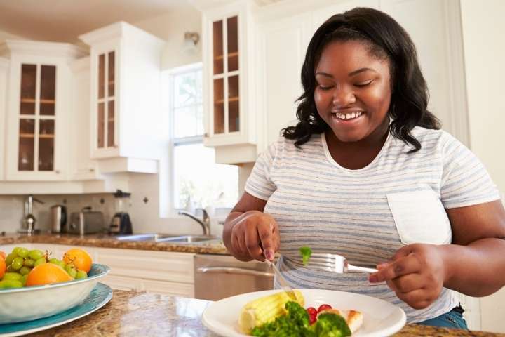 woman eating healthy meal